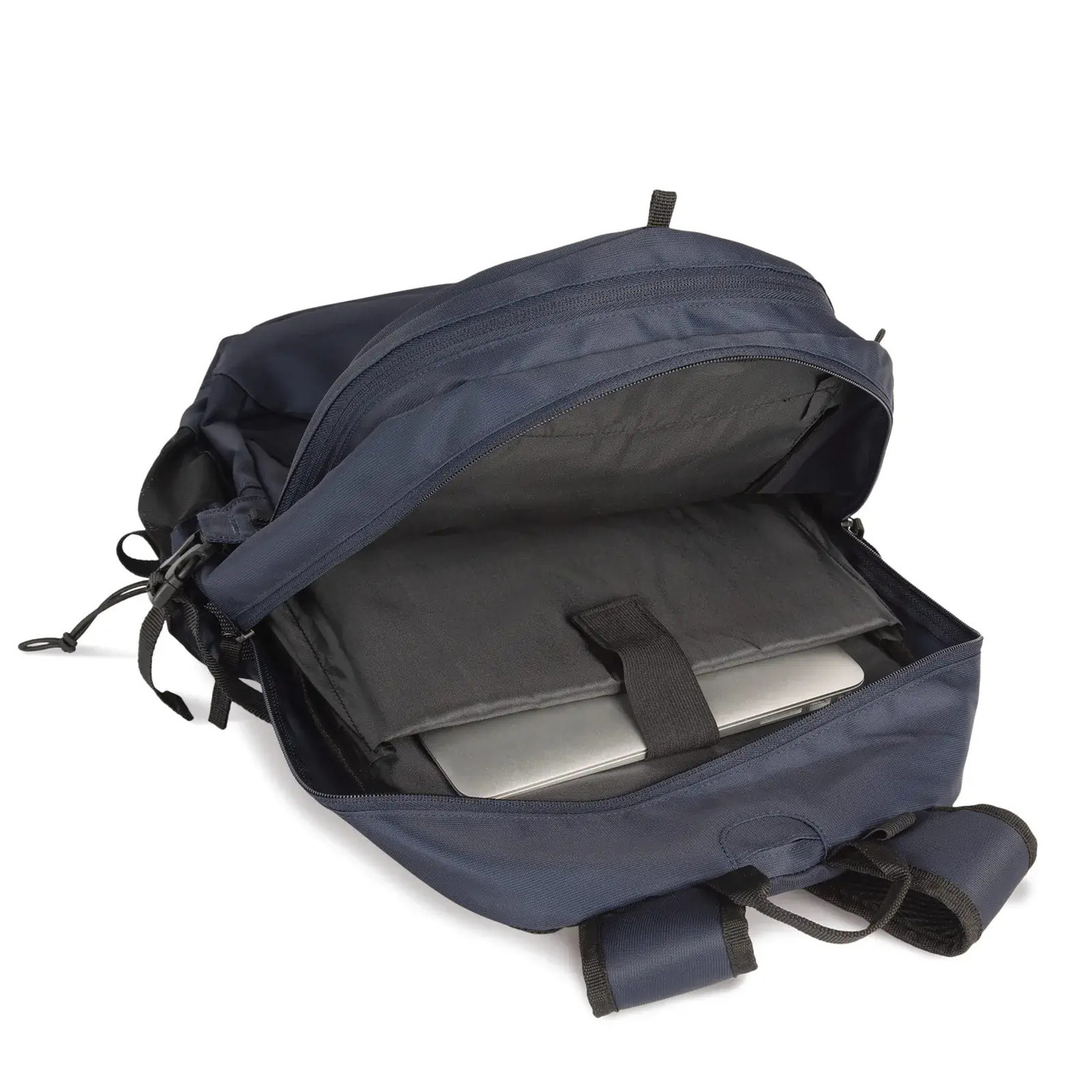 Mochila azul marino abierta con compartimento interior para portátil